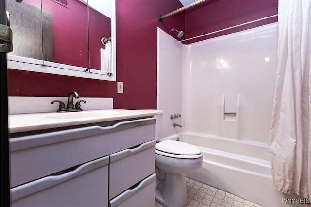 full bathroom with vanity, toilet, and shower / bath combo with shower curtain