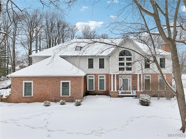 view of snow covered property