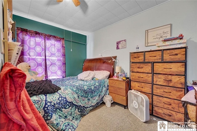 carpeted bedroom with ceiling fan