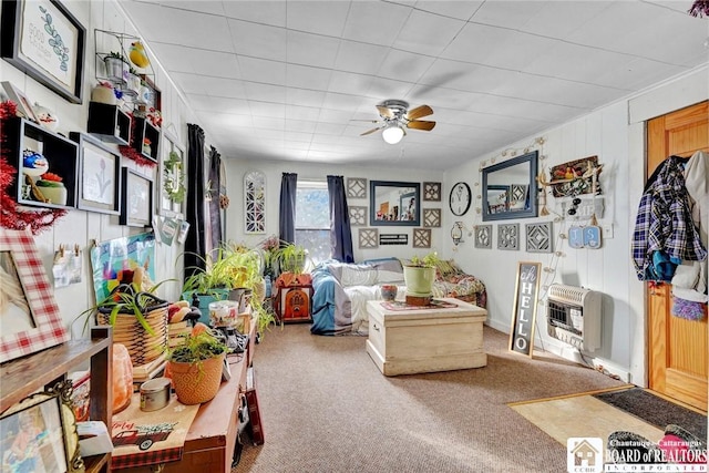 interior space featuring carpet flooring and heating unit