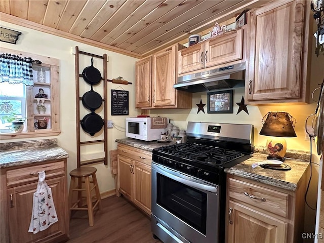 kitchen featuring dark hardwood / wood-style floors, dark stone counters, ornamental molding, stainless steel gas range, and wooden ceiling