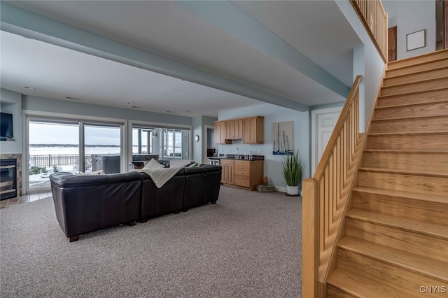 living room with light colored carpet