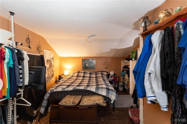 bedroom with lofted ceiling