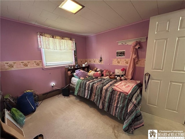 bedroom featuring a baseboard radiator and carpet floors