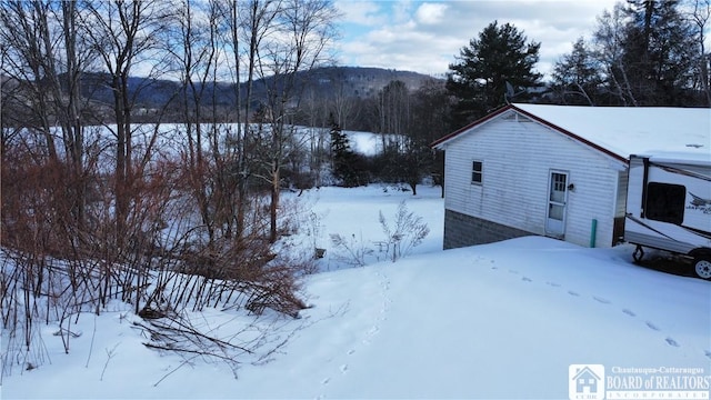 exterior space featuring a mountain view