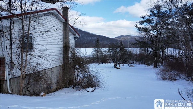 exterior space featuring a mountain view