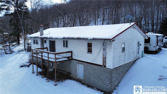 exterior space with a wooden deck