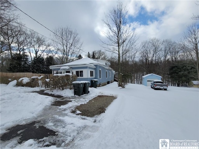 view of snow covered property