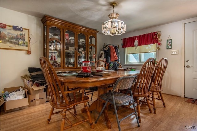 dining area with light wood-type flooring