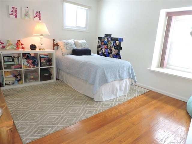 bedroom featuring wood-type flooring