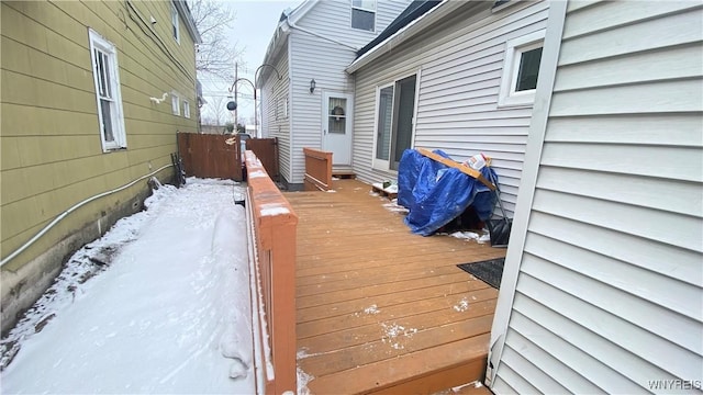 view of snow covered deck