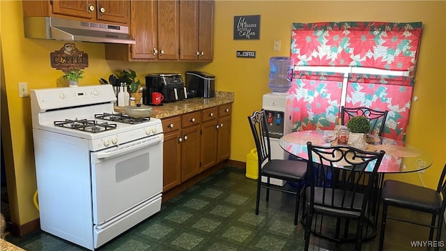 kitchen featuring gas range gas stove