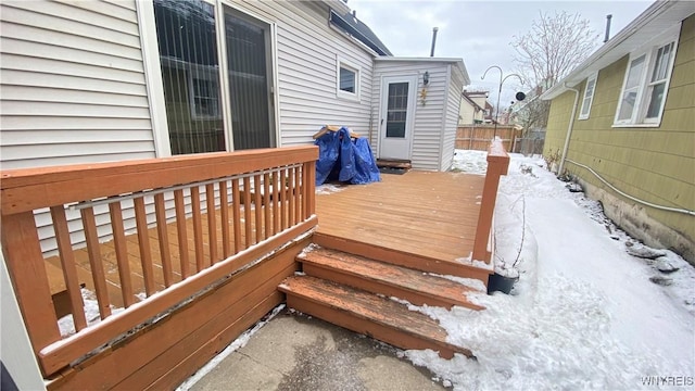 view of snow covered deck