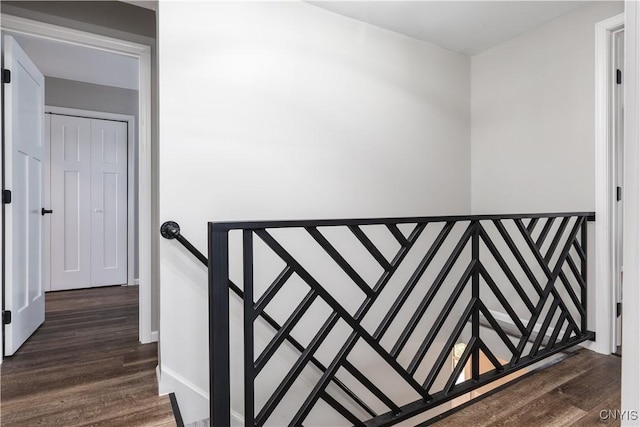 stairs with wood-type flooring