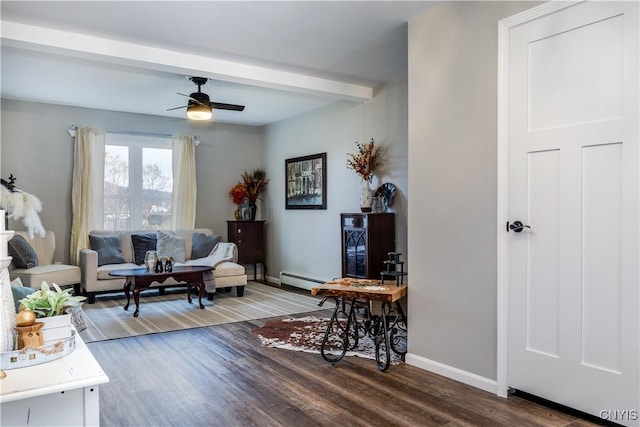 living room with beamed ceiling, a baseboard heating unit, hardwood / wood-style floors, and ceiling fan