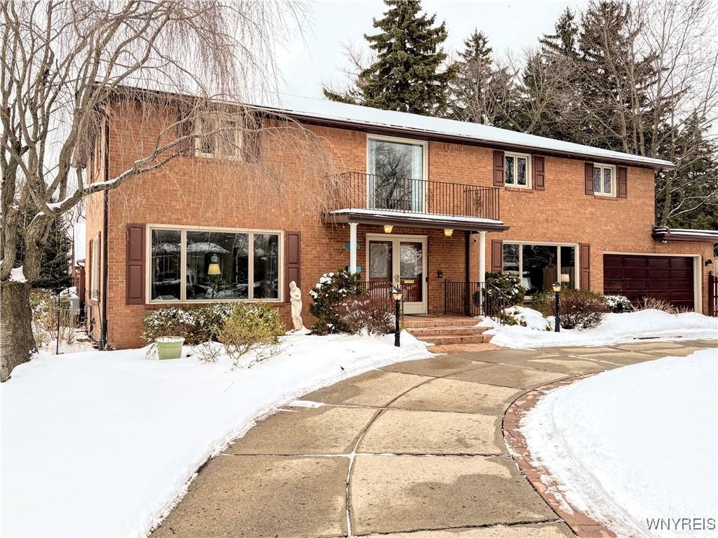 30 Longleat Pkwy, Amherst, NY 14226 - view of front facade with a garage and a balcony