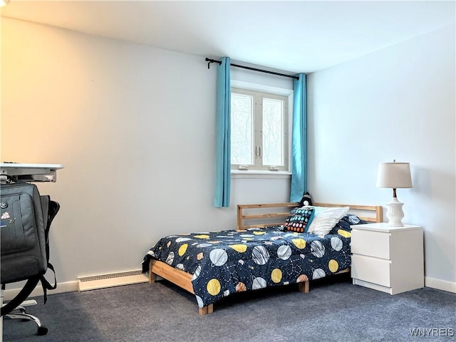 bedroom with dark colored carpet and a baseboard radiator