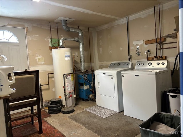 laundry area with separate washer and dryer and water heater