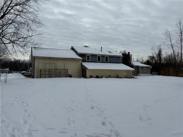 view of snow covered house