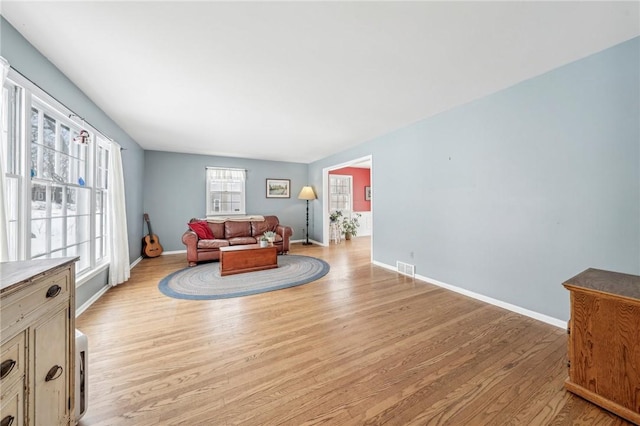 living room featuring light wood-type flooring