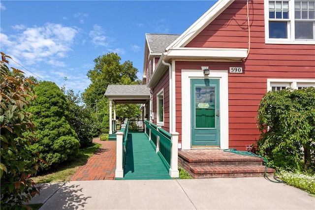 entrance to property with covered porch