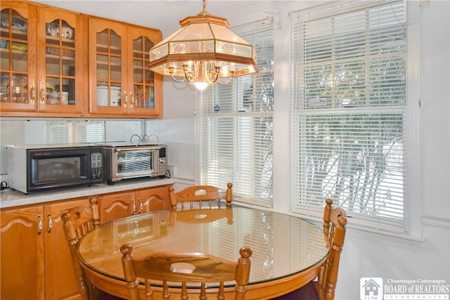 dining room with a notable chandelier