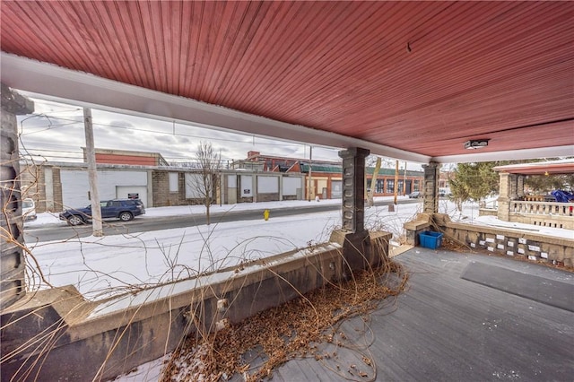 view of snow covered deck