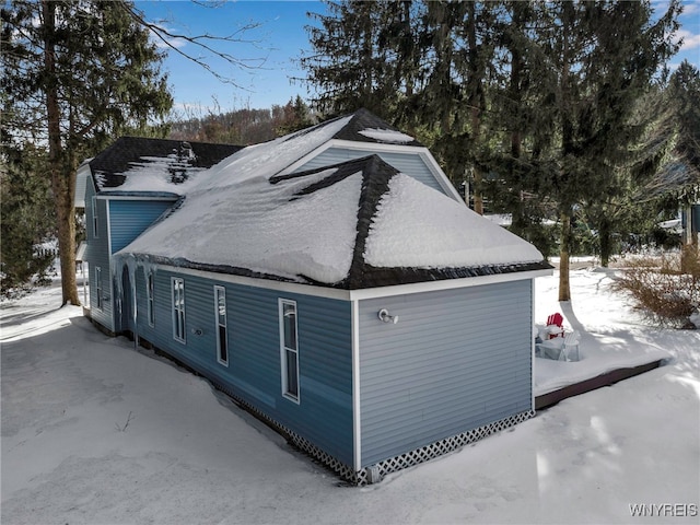 view of snow covered property