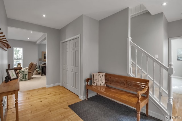 foyer with wood-type flooring