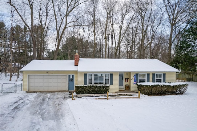 single story home with a garage