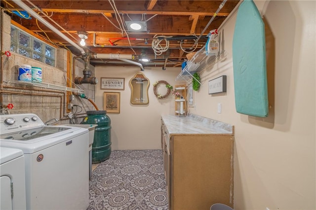 clothes washing area featuring washing machine and dryer