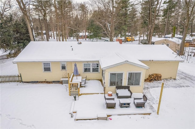 view of snow covered house