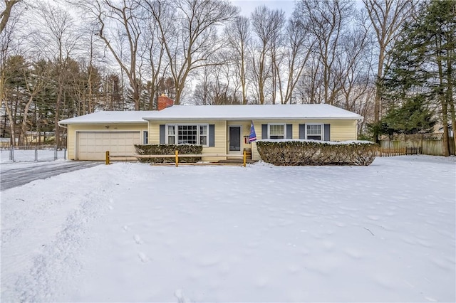 single story home with a garage