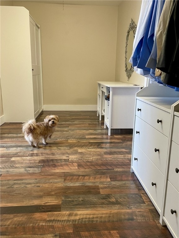405 2nd Ave, Wayland, NY 14572 - laundry area featuring dark wood-type flooring and baseboards