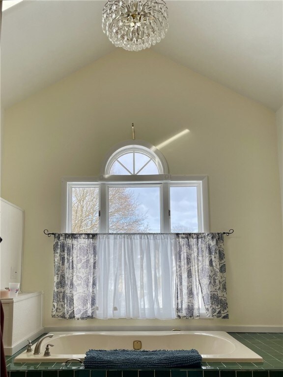 interior details featuring a chandelier