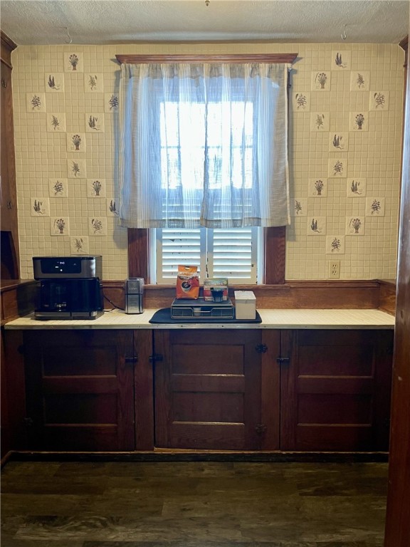 405 2nd Ave, Wayland, NY 14572 - kitchen with a textured ceiling, light countertops, plenty of natural light, and dark wood-style flooring