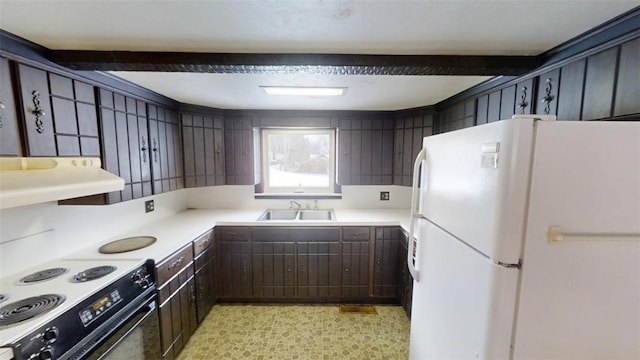 kitchen with range with electric stovetop, extractor fan, sink, white refrigerator, and dark brown cabinets