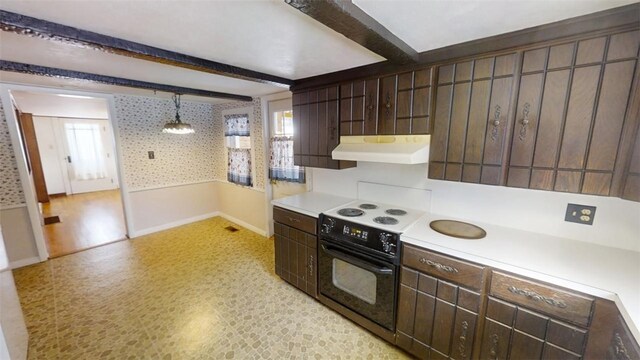 kitchen featuring pendant lighting, black range with electric cooktop, dark brown cabinets, and beamed ceiling