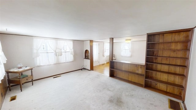 unfurnished bedroom with light carpet