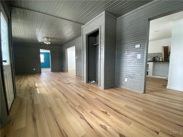 spare room featuring light wood-type flooring