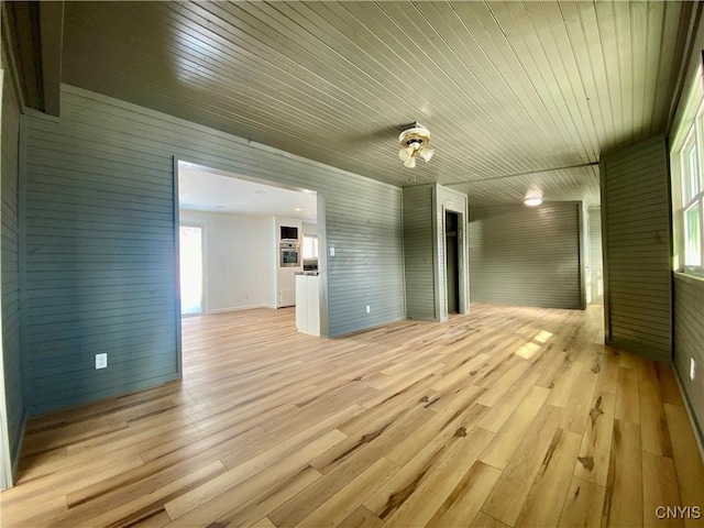 unfurnished living room featuring light wood-type flooring