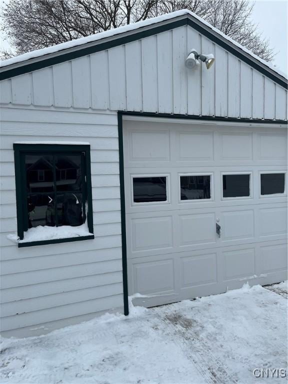 view of snow covered garage