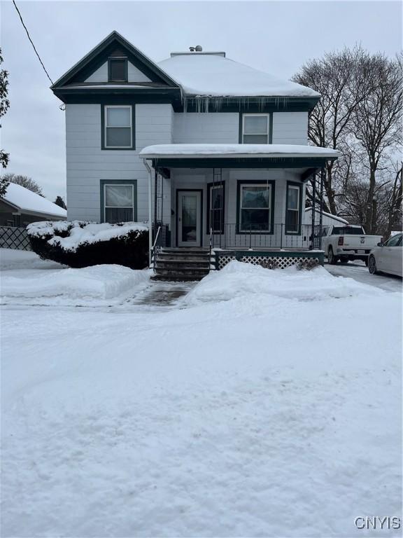 front facade with a porch