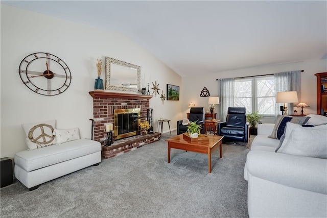 living room featuring a fireplace, vaulted ceiling, and carpet