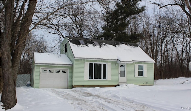 view of front of property with a garage