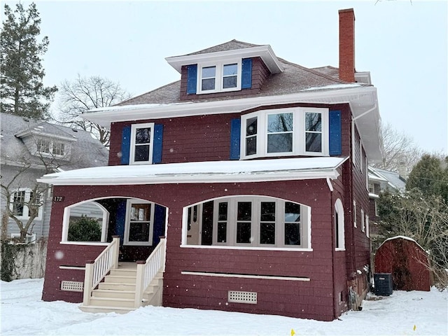 view of front of house featuring central air condition unit