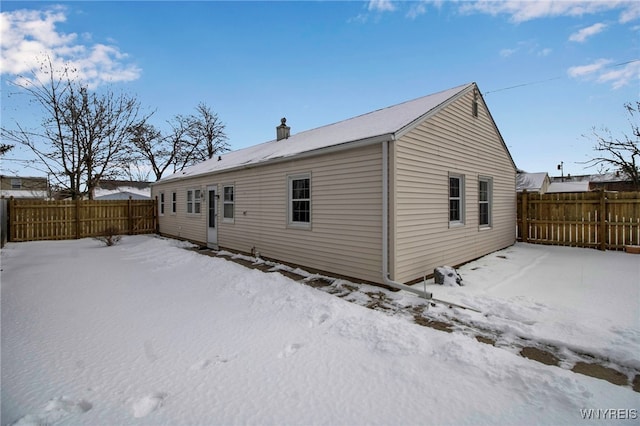 view of snow covered property