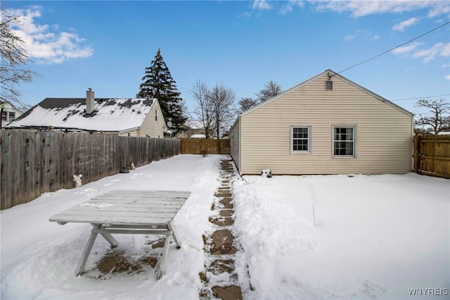 view of yard covered in snow