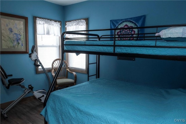 bedroom featuring hardwood / wood-style flooring