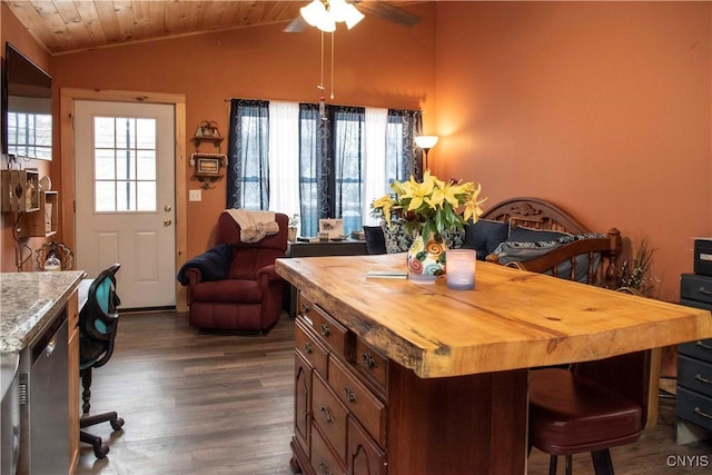 dining room featuring vaulted ceiling, dark hardwood / wood-style floors, wooden ceiling, and ceiling fan